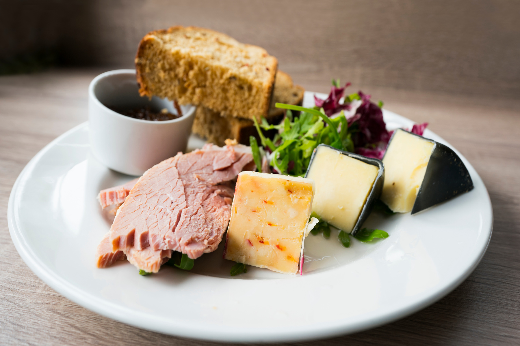 Ploughman's lunch of meat, bread and cheese